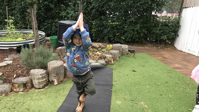 Lane Cove kids ease the pressure via yoga poses, gardening and lots of outside time. Picture: Supplied