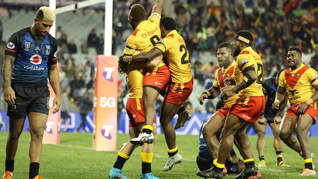 Papua New Guinea celebrate Lachlan Lam’s try against Fiji. Picture: Mark Kolbe/Getty Images