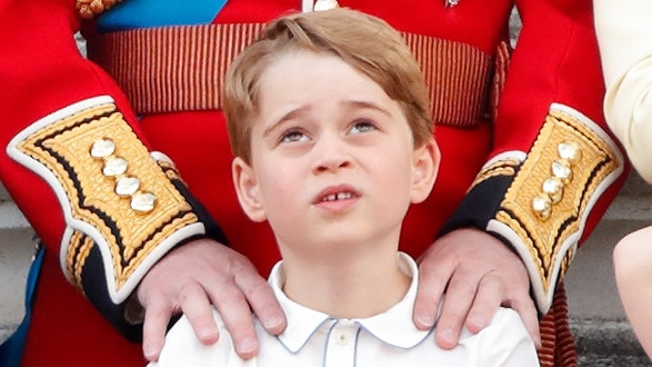 LONDON, UNITED KINGDOM - JUNE 08: (EMBARGOED FOR PUBLICATION IN UK NEWSPAPERS UNTIL 24 HOURS AFTER CREATE DATE AND TIME) Prince George of Cambridge watches a flypast from the balcony of Buckingham Palace during Trooping The Colour, the Queen's annual birthday parade, on June 8, 2019 in London, England. The annual ceremony involving over 1400 guardsmen and cavalry, is believed to have first been performed during the reign of King Charles II. The parade marks the official birthday of the Sovereign, although the Queen's actual birthday is on April 21st. (Photo by Max Mumby/Indigo/Getty Images)