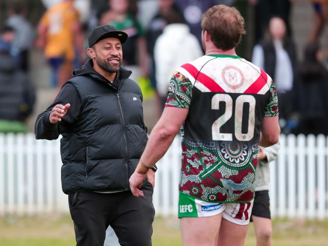 Roy Asotasi congratulates George Burgess following the game. Picture: Adam Wrightson Photography