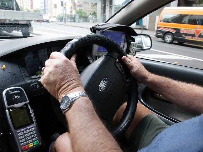 Generic taxi images, Brisbane. A taxi app has revealed shortcuts to hiring a cab, and what not to do, when hailing a cab at Christmas.Photographer: Liam Kidston.