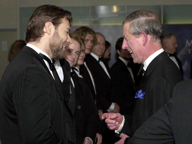 Charles talks to Russell Crowe as he arrives for the screening of Master and Commander.