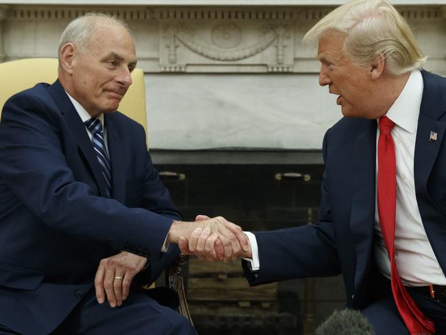 President Donald Trump and new White House Chief of Staff John Kelly after he was privately sworn in a ceremony in the Oval Office with President Donald Trump on Monday. Picture: Evan Vucci/AP