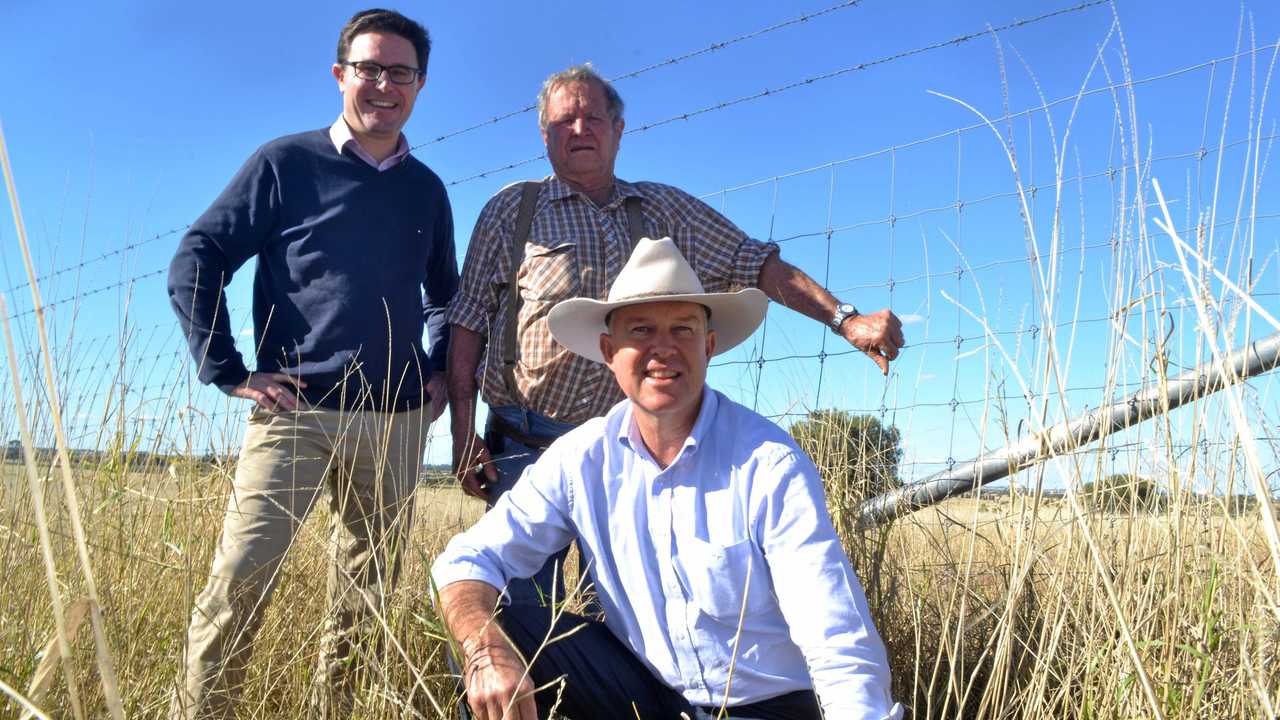 FENCING: Minister for Agriculture David Littleproud with grazier Bill Purcell and Shadow Minister Development Tony Perrett in Roma. Picture: Molly Hancock