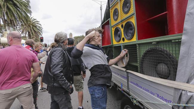 A Right-wing youth punches a set of speakers belonging to the Left. Picture: Wayne Taylor 