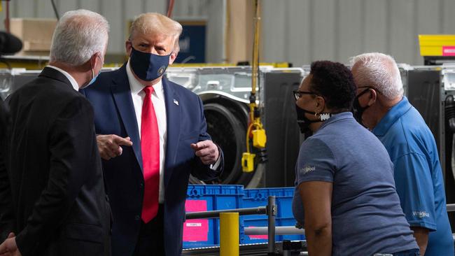 Donald Trump tours the Whirlpool factory in Clyde, Ohio, on Friday. Picture: AFP