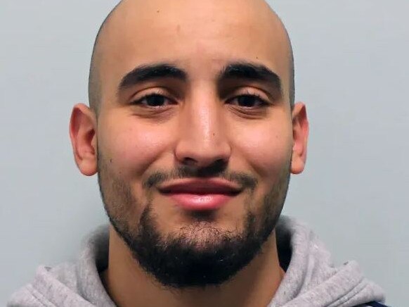 Hitman Anis Hemissi, 24, grinned in his mugshot after being caught by police. Pictured: Supplied