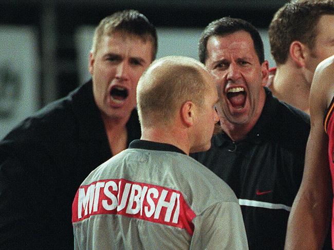 Parky and Goorj giving former NBL referee Ray Hunt some friendly advice.