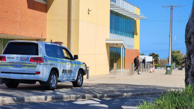 SAPOL officers and specialist Organised Crime Gang detectives outside Christies Beach Magistrates Court alleged bikies appeared.