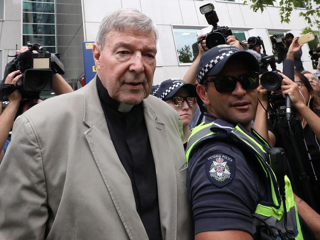 Cardinal George Pell leaves the County Court.