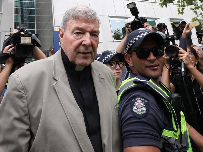 Cardinal George Pell leaves the County Court. 