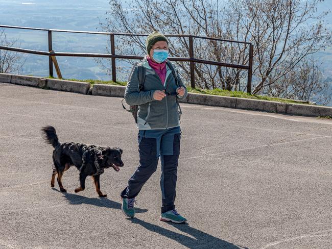 Woman wearing face mask due to Covid-19, Slovenia, Europe. Nikon D3x