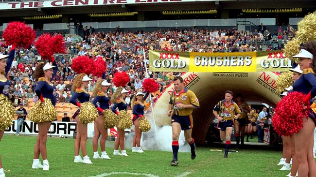 Trevor Gillmeister runs out for the Crushers at Suncorp Stadium in 1996. Picture: Getty Images