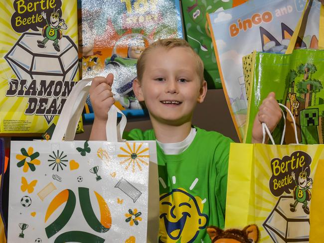 AUGUST Thursday 17 2023SHOWBAG Launch at Adelaide Royal showgrounds.  Ezra Jaeschke 8 with Bertie Beetle and MathildaÃs showbags. Picture: Roy VanDerVegt