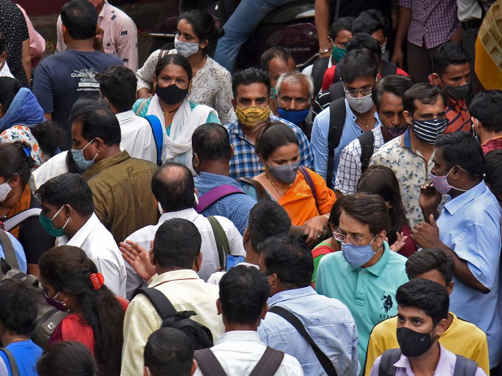 People crowd along a busy road in Mumbai, as India overtook Brazil as the country with the second-highest number of coronavirus infections. Picture: Sujit Jaiswal / AFP