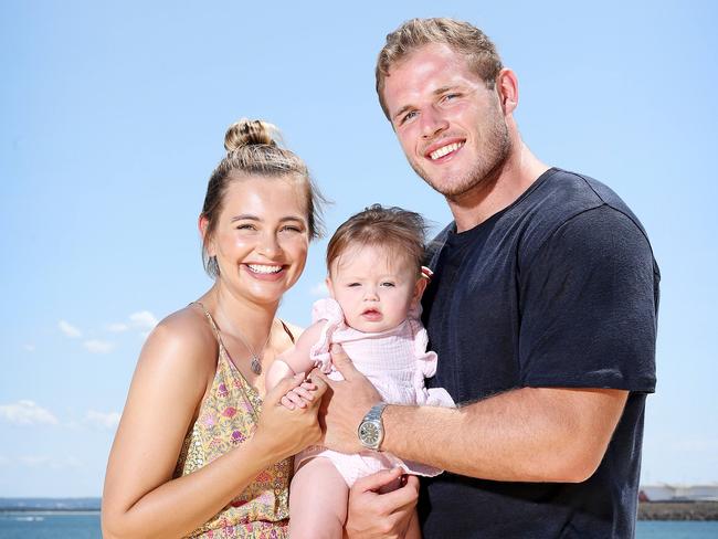 Tahlia Giumelli and Tom Burgess with their daughter Sophie, then six months old. Picture: Tim Hunter