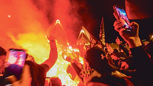 On October 9, before Israel’s military response had begun, protesters gathered at the Sydney Opera House to burn the Israeli flag and insult Jews. Picture: NCA NewsWire/Jeremy Piper