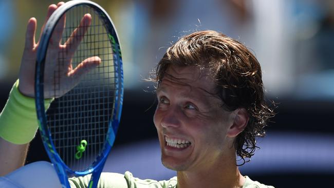 Czech Republic’s Tomas Berdych is all smiles after belting Italy’s Fabio Fognini. Picture: AFP