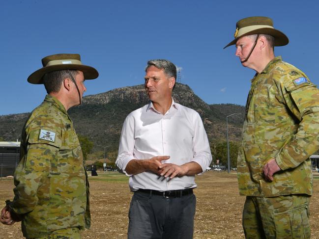 Commander 3rd Brigade Dave McCammon and Acting chief of Army Major General Richard Vagg with Deputy Prime Minister Richard Marles (centre) at Lavarack Barracks in Townsville. Picture: Evan Morgan