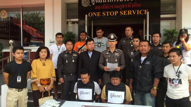 Hua Hin police stand behind two suspects arrested following the assault. Picture: Hua Hin Police via AP