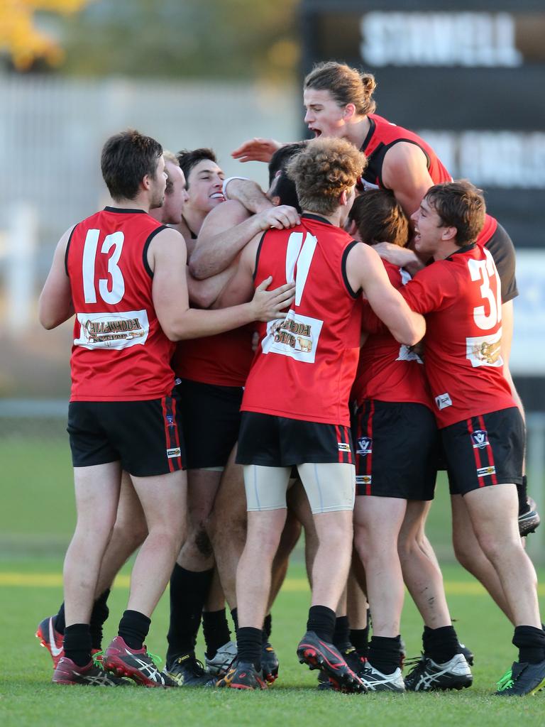 Wimmera Football League round 7 match between Stawell Warriors and Warrack Eagles. Stawell 13. 8 (84) defeated Warracknabeal 11. 13 (79). Stawell boys celebrate their win. Picture: Yuri Kouzmin