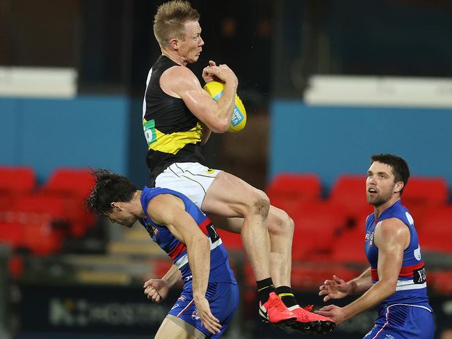 Jack Riewoldt flies over Easton Wood. Picture: Michael Klein