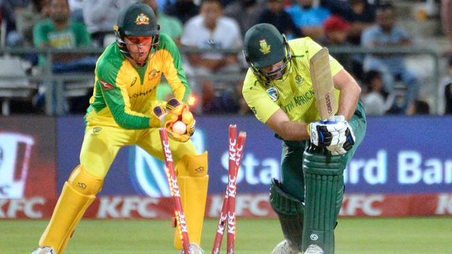 Adam Zampa rips through the defences of Piet van Biljon.