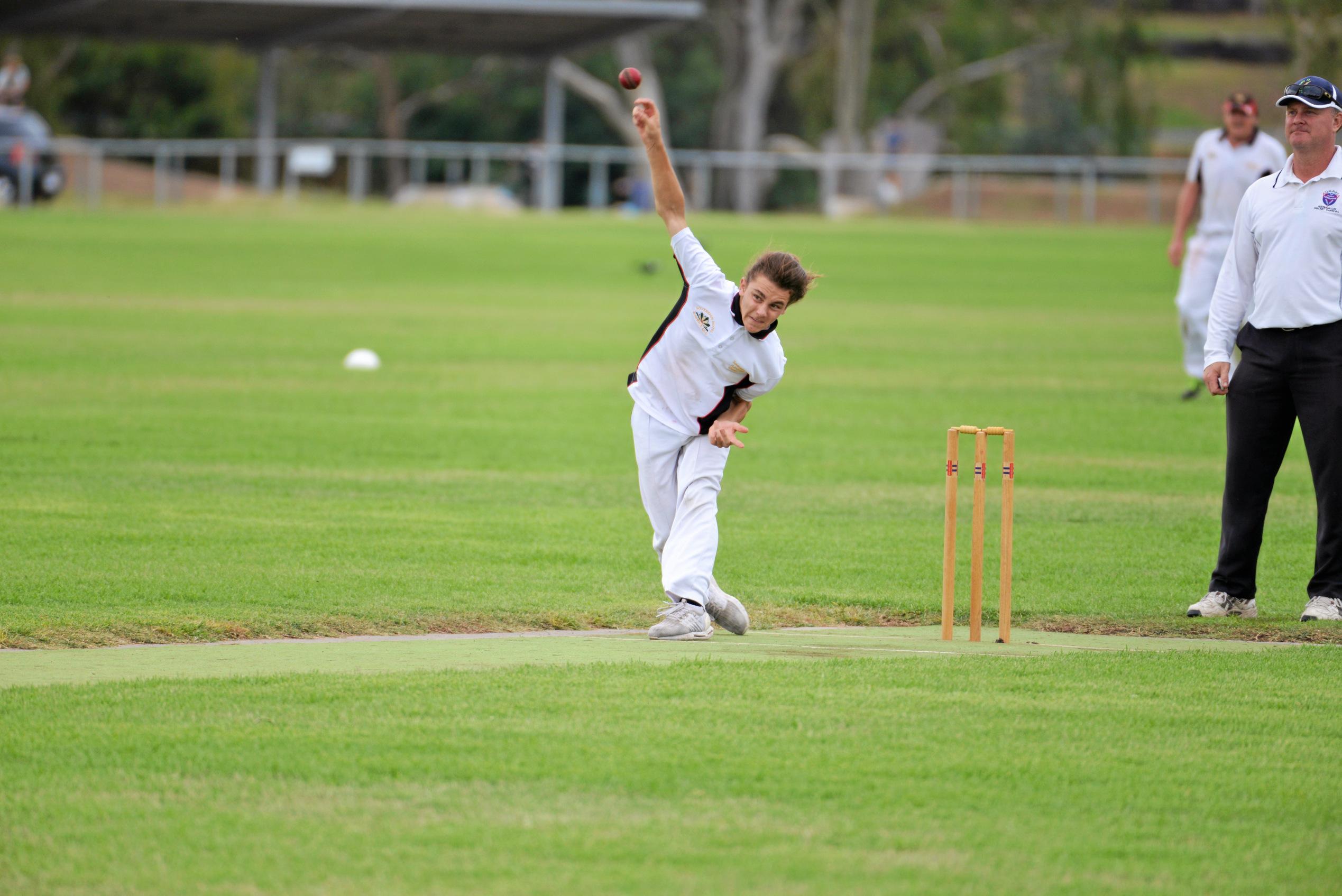 Joe Wagner bowls for Sovereign Animals at Queens Park in grand final cricket. Picture: Gerard Walsh