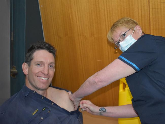 Longreach resident Justin Griffiths was immunised by nurse Anne Strachan on August 3, and was the recipient of the 10,000th dose of a COVID-19 vaccine delivered in the Central West region.