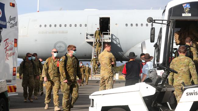 ADF members from Townsville arrive in Hobart to assist with the arrival of seasonal workers from Timor-Leste and the scheduled chartered flight from India. Picture: NIKKI DAVIS-JONES