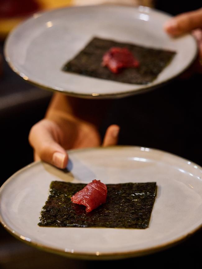 The first course of Mures’ Southern bluefin four-course degustation meal, is a canape featuring tuna direct from the frame, on nori seaweed. Picture: Samuel Shelley