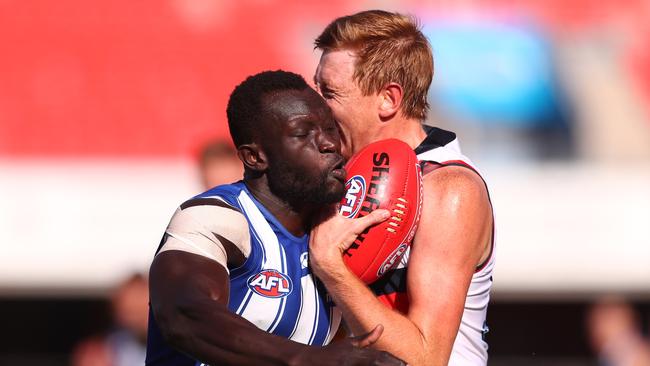 Debutant Kieran Strachan got some treatment from Majak Daw. Picture: AFL Photos/Getty Images