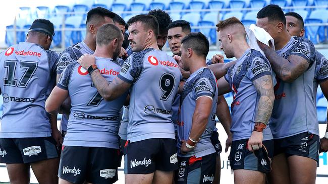 Warriors players during their Round 2 NRL match against the Canberra Raiders. Picture: AAP Image/Dave Hunt.