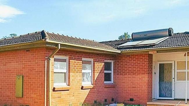 The listing has since been edited to crop out the fluorescent lawn. Picture: realestate.com.au