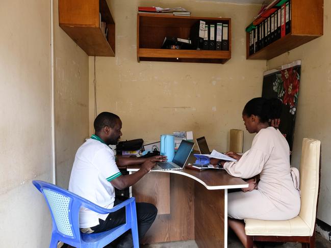 KAMPALA, UGANDA - FEBRUARY 12: Two members of the senior management team for Uganda Young Positives (UYP) continue work for the organization on a voluntarily basis, following USAID cuts, on February 12, 2025 in Kampala, Uganda. Uganda Young Positives (UYP) is a non-governmental organization dedicated to improving the quality of life for young people living with HIV/AIDS, and reducing infection rates through awareness campaigns and programs. Uganda has been a major beneficiary of HIV/AIDS treatment and prevention programs funded by the President's Emergency Plan for AIDS Relief (PEPFAR), in conjunction with The United States Agency for International Development (USAID). Following US President Donald Trump's executive order to pause all USAID funding for 90 days, UYP's Executive Director Kruish Mubiru says that 95% of his organization's programs and staff have been impacted by the cuts. US and global health officials have warned that the impacts of the cuts will be detrimental, and in some cases fatal, to people living with the disease, as well as the decades-long efforts to stem infection rates. (Photo by Hajarah Nalwadda/Getty Images)