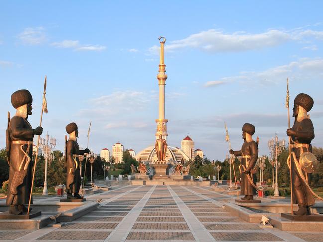 Monument Arch of Independence at sunset, Ashkhabad, Turkmenistan.