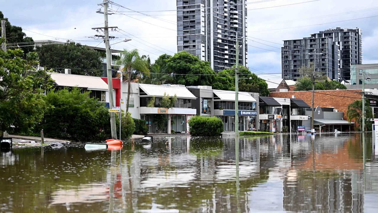 AFTER: Douglas street in Milton inundated by floodwater. Picture: NCA NewsWire / Dan Peled