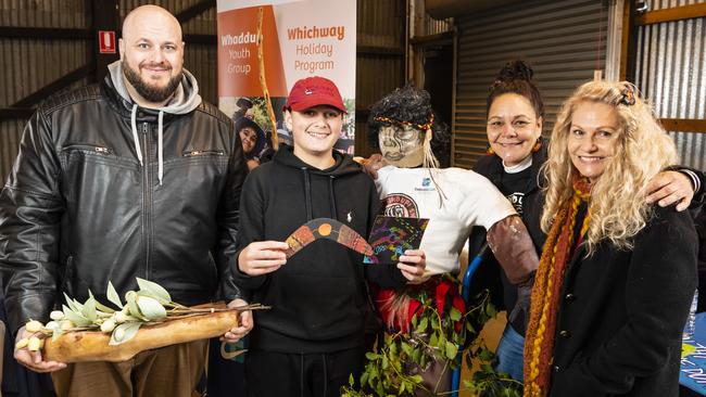 With a figure of the warrior Multuggerah are (from left) Luke Yuginovich, Jett Silcox, Robyn Silcox and Brenda Holman at the Toowoomba NAIDOC Week celebrations at The Goods Shed, Monday, July 4, 2022. Picture: Kevin Farmer