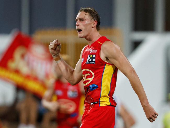 DARWIN, AUSTRALIA - MAY 11: Sam Clohesy of the Suns celebrates a goal during the 2024 AFL Round 09 match between the Gold Coast SUNS and North Melbourne Kangaroos at TIO Stadium on May 11, 2024 in Darwin, Australia. (Photo by Dylan Burns/AFL Photos via Getty Images)