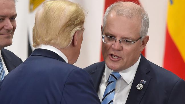 Scott Morrison chats with US President Donald Trump in Japan. Picture: AFP