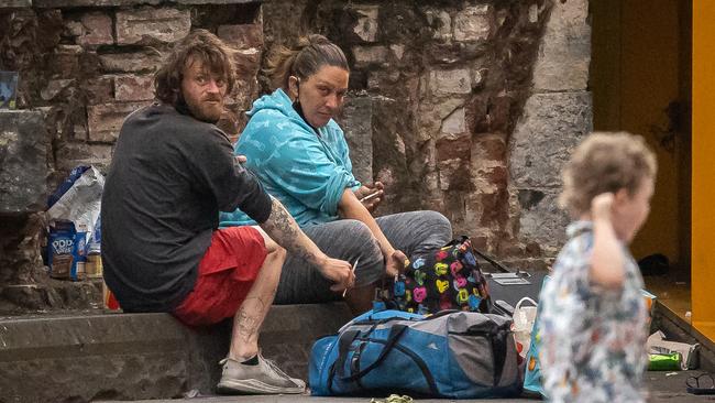 A man and a woman openly inject drugs in Southbank. Picture: Jason Edwards