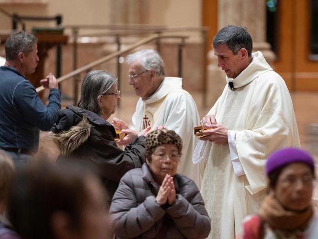 Parishioners attend a mass at Holy Name Cathedral to celebrate Cardinal Robert Prevost, who was born in Chicago, being named as the first American leader of the Catholic Church. Picture: Getty