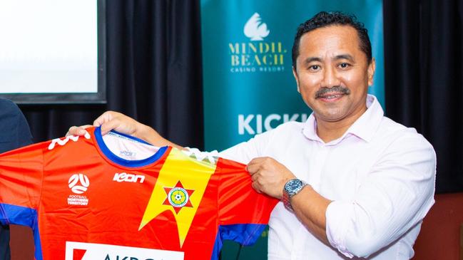 Darwin Hearts Football Club's Hem Pun holding up his club's jersey at the 2023 awards night. Picture: Darwin Hearts Football Club Facebook page.