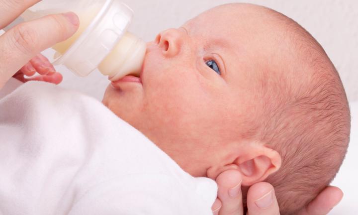 Putting cereal in baby hot sale milk