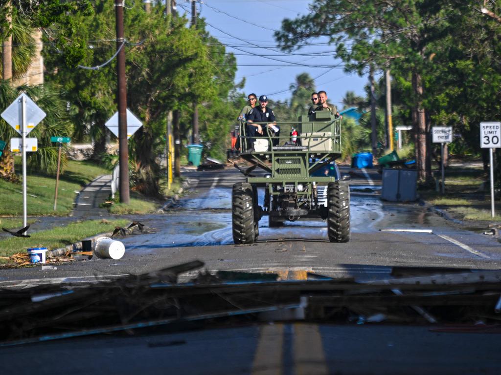 A rescue vehicle makes its way through a flooded street after Hurricane Helene made landfall in Cedar Key. Picture: AFP.