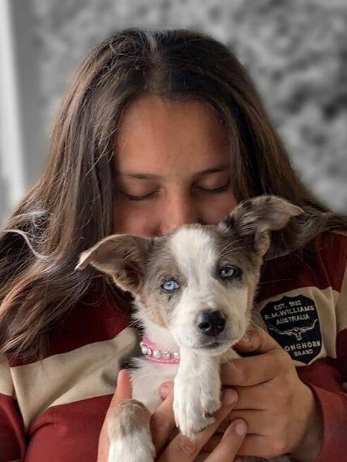 Ella Simmonds and her dog, Fly. Picture: Supplied