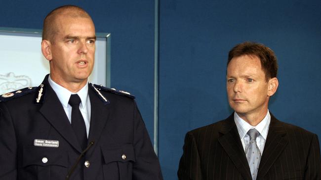 Simon Overland (left) and former Victorian Police Minister Bob Cameron (right).