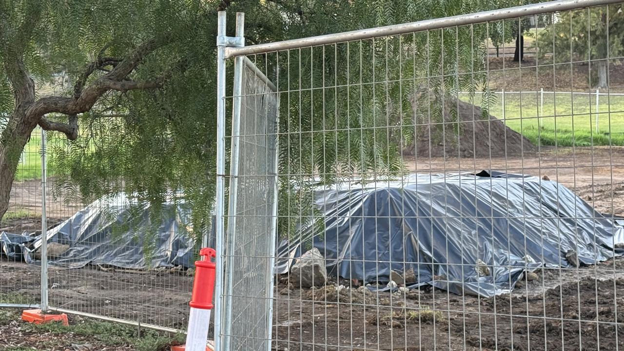 Residents say they worry the tarp-covered mound contains asbestos. Picture: Supplied.