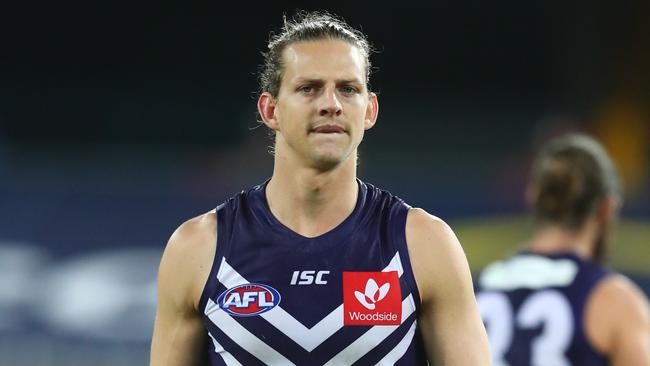 GOLD COAST, AUSTRALIA - JUNE 27: Nat Fyfe of the Dockers leaves the field injured during the round 4 AFL match between the Gold Coast Suns and Fremantle Dockers at Metricon Stadium on June 27, 2020 in Gold Coast, Australia. (Photo by Chris Hyde/Getty Images)