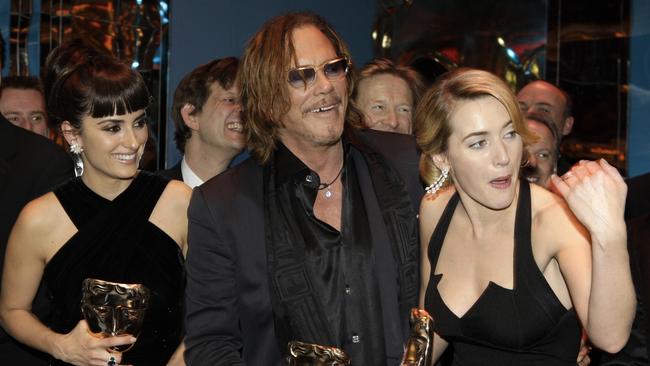 Mickey Rourke, with Penelope Cruz and Kate Winslet, after winning Best Actor award for his role in 'The Wrestler'. Picture: AP Photo